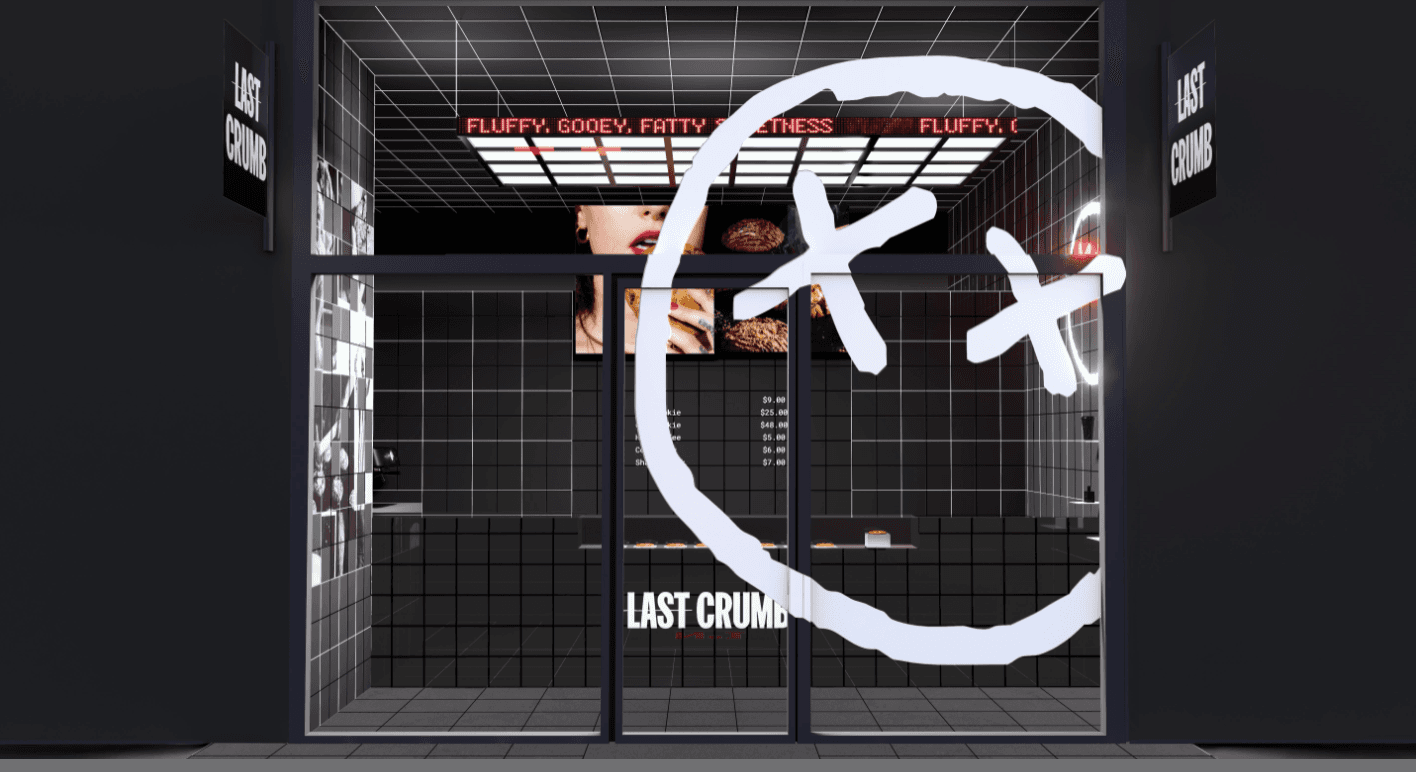 The Last Crumb storefront with black tile and the white face logo across the glass.