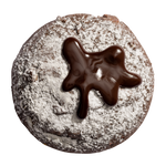 A chocolate cookie with powdered sugar on top and a dollop of chocolate sauce melting on the surface.
