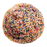 A cookie topped with multicolored sprinkles and a drizzle of vanilla frosting.